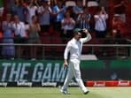 South Africa's Dean Elgar walks onto the field during his last test match 